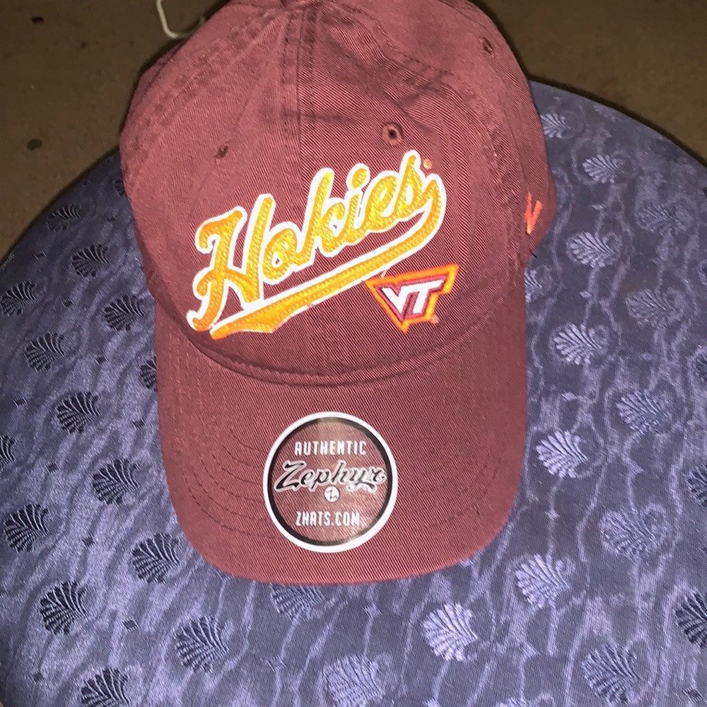 It’s a mid size adjustable hat zhats brands